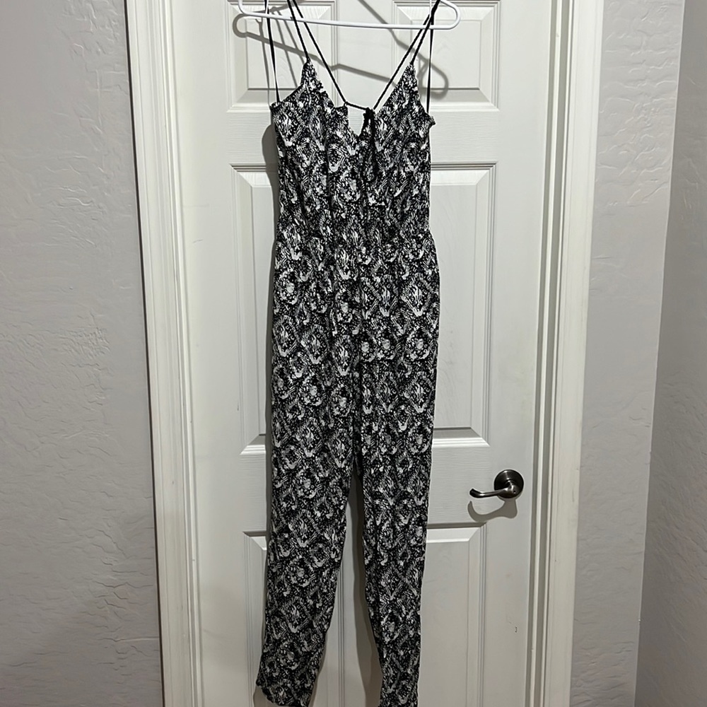 Worn once jumper. Super comfy with cute back tie detail.